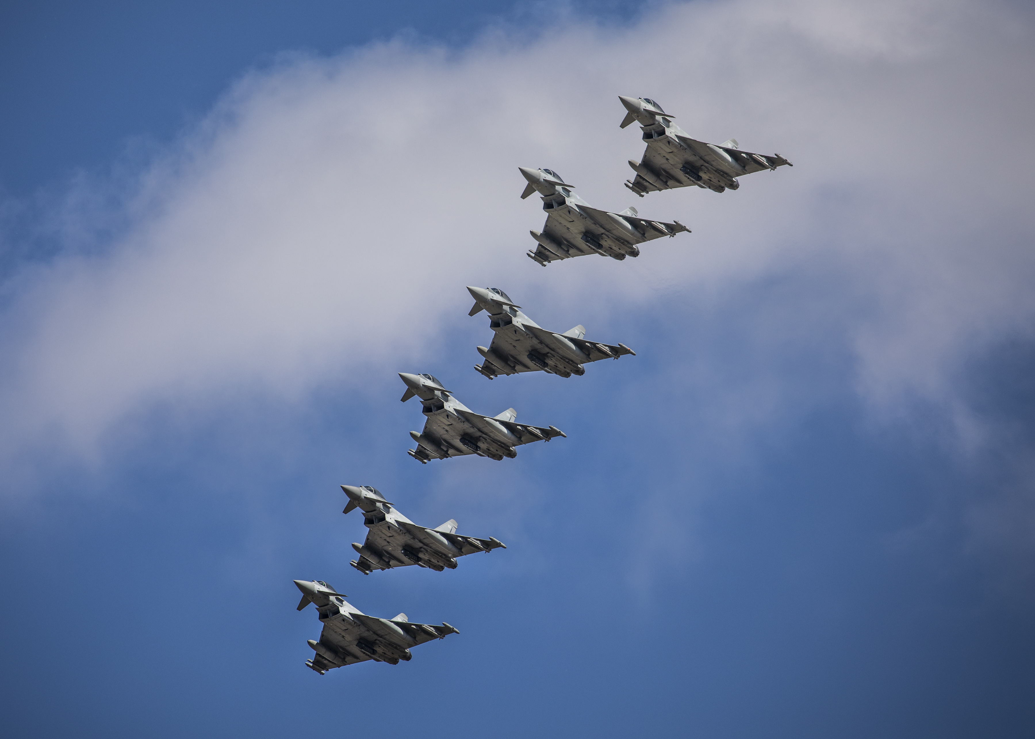 Image shows Typhoons flying in formation.